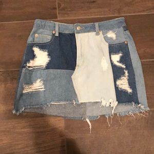 Patchwork distressed denim skirt